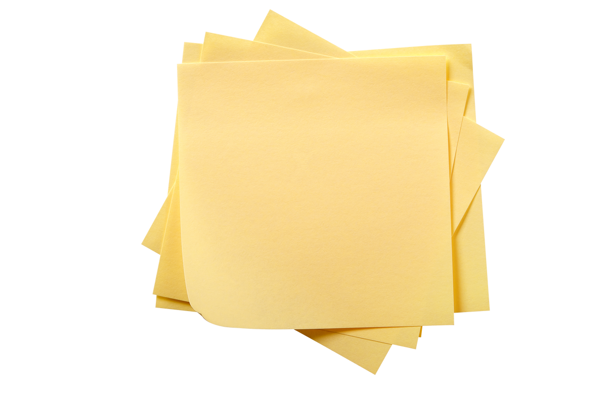 Untidy Stack of Several Yellow Sticky  Notes