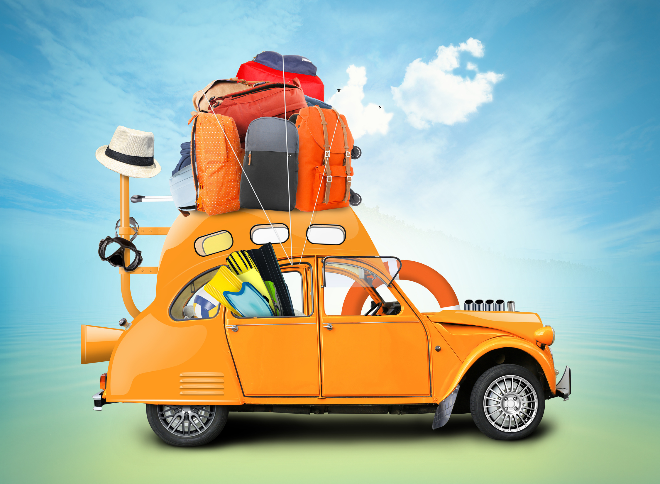 A yellow car packed for traveling